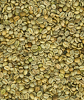 A close-up image of green, unroasted coffee beans.